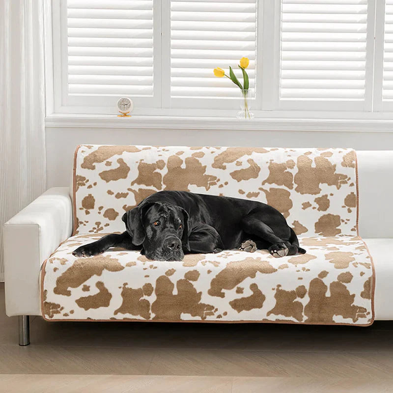 Stylische Haustierdecke im Kuhfell-Design
