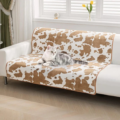 Stylische Haustierdecke im Kuhfell-Design