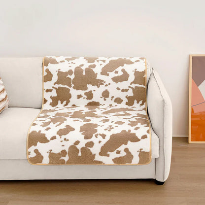 Stylische Haustierdecke im Kuhfell-Design